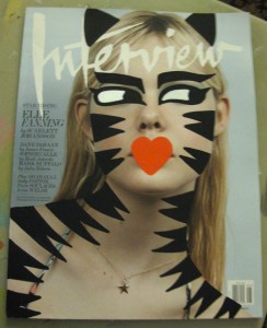 Demure cover model transformed  into Tiger Girl!